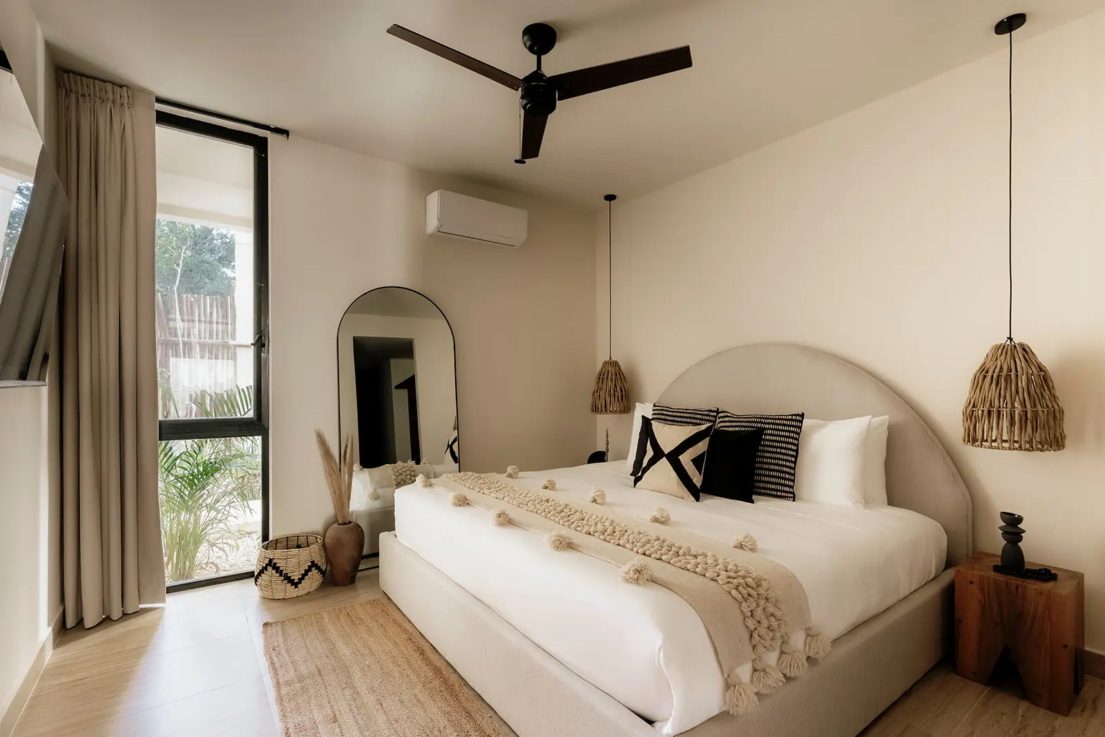 Primary bedroom with king bed in Tulum vacation rental